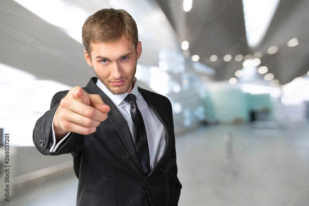 Young handsome businessman pointing on you Young handsome businessman pointing on you