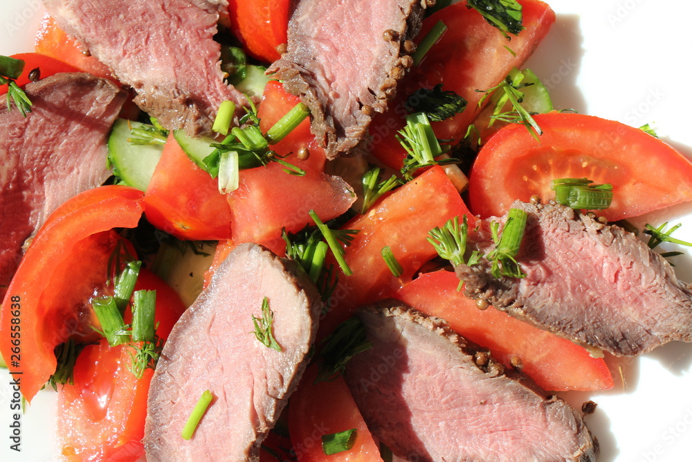 Salad with roast beef and tomatoes Salad with roast beef and tomatoes