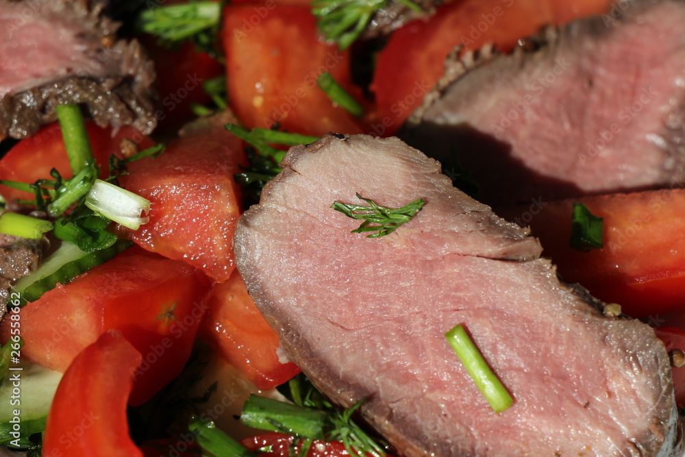 Salad with roast beef and tomatoes Salad with roast beef and tomatoes