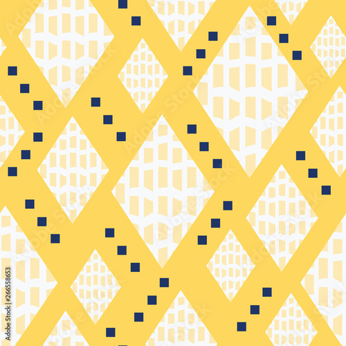 Geometric diamond shape seamless pattern with textured fill and randomly placed tiny squares. Vector repeating tile, yellow, white, navy blue. Fashion, gift wrapping paper, textiles and home decor.