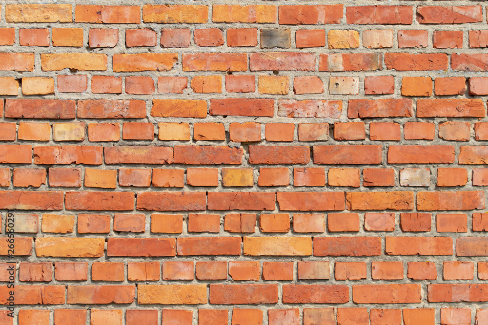 A brick wall as background, very sharp nice orange color and beautiful structure A brick wall as background, very sharp nice orange color and beautiful structure