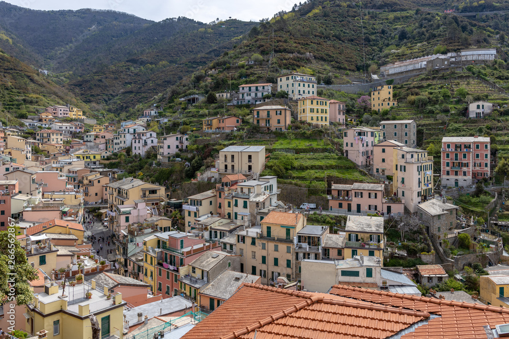 RIOMAGGIORE, LIGURIA/ITALY  - APRIL 21 : View of Riomaggiore Liguria Italy on April 21, 2019. Unidentified people