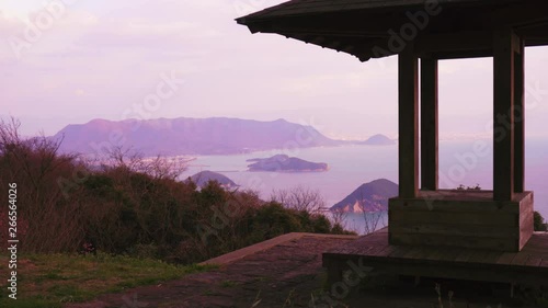 View of the Seto Inland Sea over the japanese gazebo from Mt. Shiudeyama from Mitoyo city, Kagawa Prefecture. photo