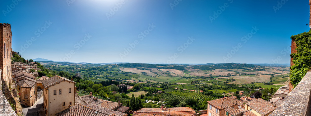 Panorama of the vineyard hills of Val d'Orcia from the medieval town of Pienza in Tuscany, Italy. In 2004 the Val d'Orcia was added to the UNESCO list of World Heritage Sites 