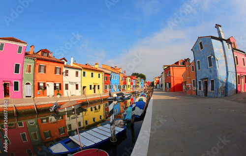 Painted Houses Burano Island near Venice in Italy with blue sky © ChiccoDodiFC