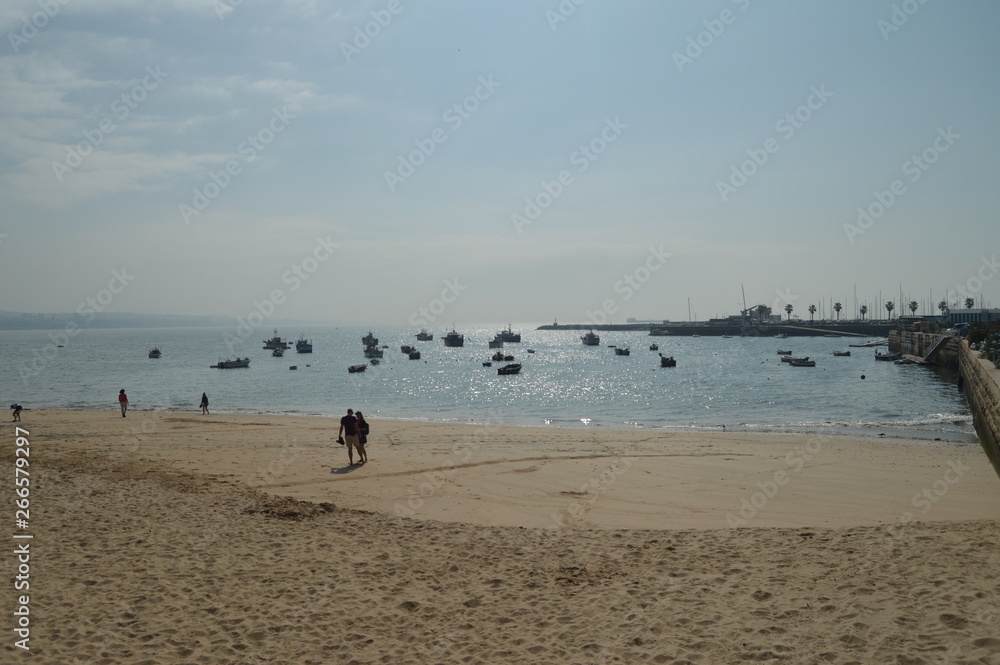 Views Of The Fishing And Sporting Port In addition To The Beach At Sunrise On The Coast In Cascais. Photograph of Street, Nature, architecture, history. April 15, 2014. Cascais, Lisbon, Portugal.