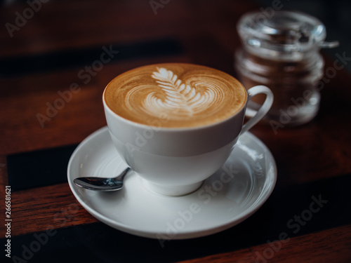 coffee latte art in cafe wi...