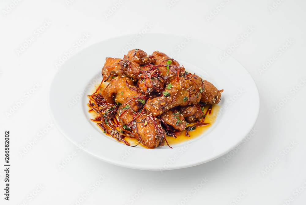 fried chicken with vegetables on white plate fried chicken with vegetables on white plate