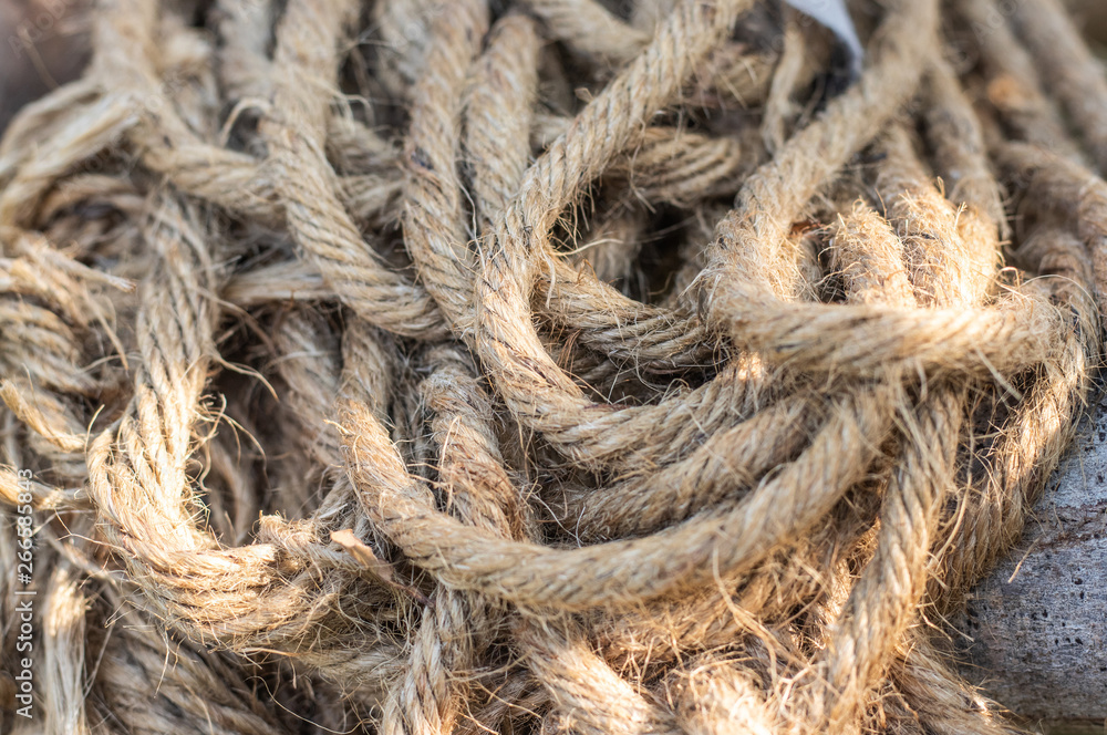 The old grunge soft and stringy hemp rope as material textured background