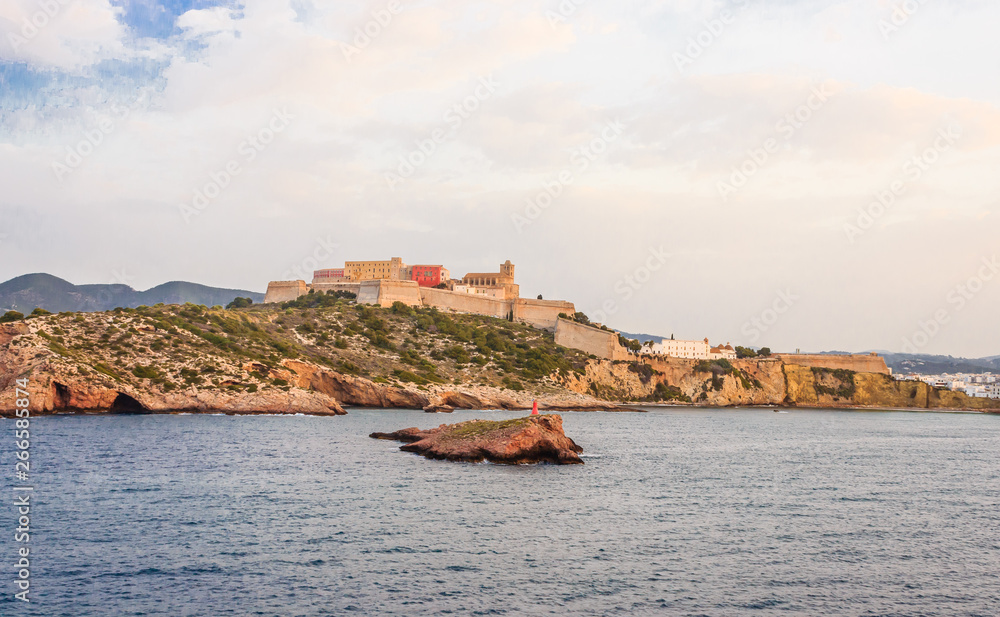  view from the sea of old Ibiza and the bulwark that surrounds it / the Bulwark of Saint Lucia is a fortified defensive enclosure that surrounds the medieval city of Ibiza declared national monument