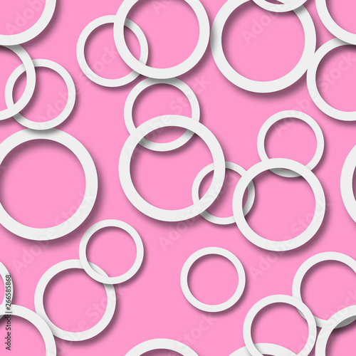 Abstract seamless pattern of randomly arranged white rings with soft shadows on pink background
