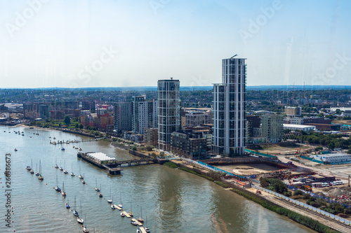 Emirates Air Line cable cars on thames river in London, UK © alzamu79