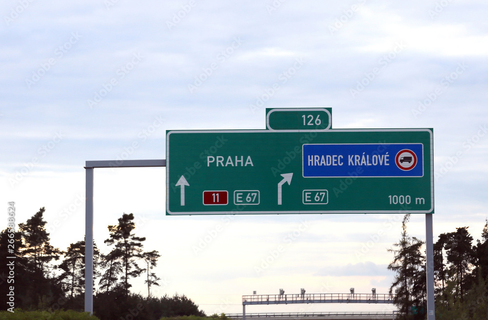 Highway sign with directions to Prague city