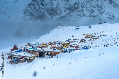 beautiful panorama of winter landscape with mountains and ski village, Dombaj, Russia