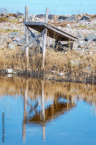 Small weathered jetty in wo...