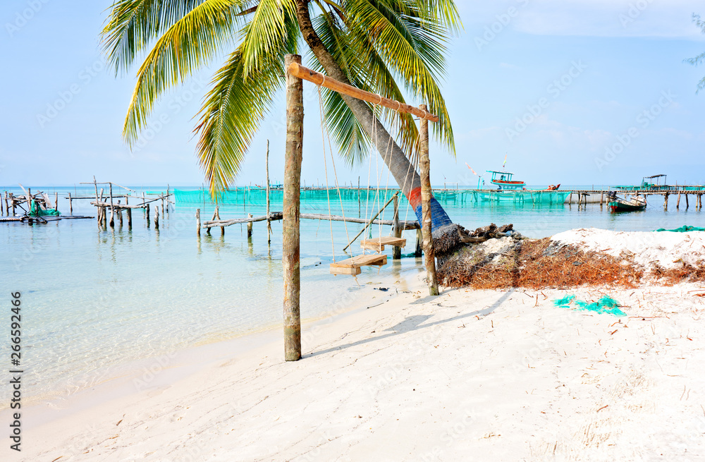 Wooden swings on the Starfish ( Rach Vem ) beach in Phu Quoc island, Vietnam