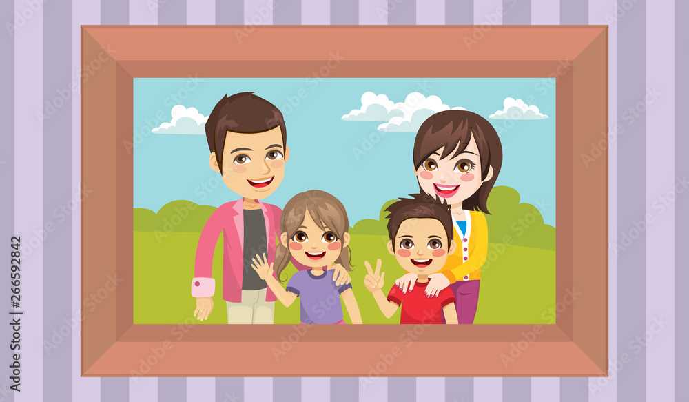 Family portrait in a frame on the wall mom dad and children happy posing together Family portrait in a frame on the wall mom dad and children happy posing together