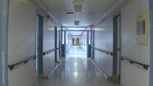 Steadicam shot rolling down hospital hallway