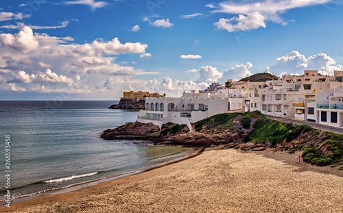 Mediterranean beach and town in Cabo de Gata natural Park, Spain. photo