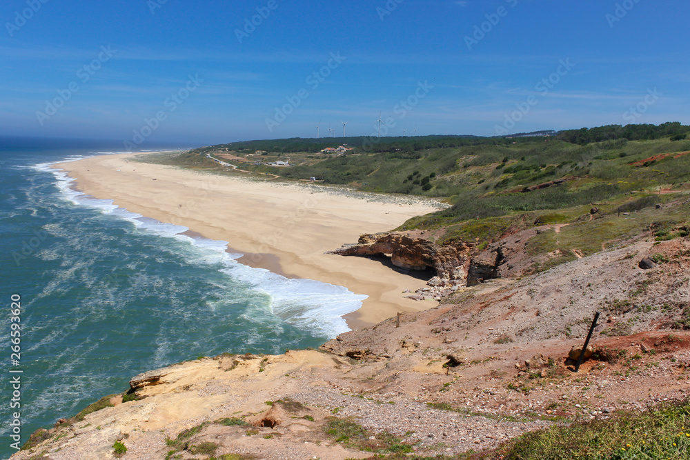 Amazing view of North Beach (Praia do Norte) coastline of Atlantic ocean. Most famous place of giant breaking waves for surfers from around the world. Nazare, Portugal Amazing view of North Beach (Praia do Norte) coastline of Atlantic ocean. Most famous place of giant breaking waves for surfers from around the world. Nazare, Portugal