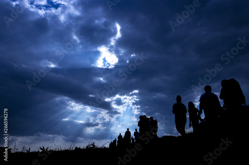 Silhouette of the emigrants on the way