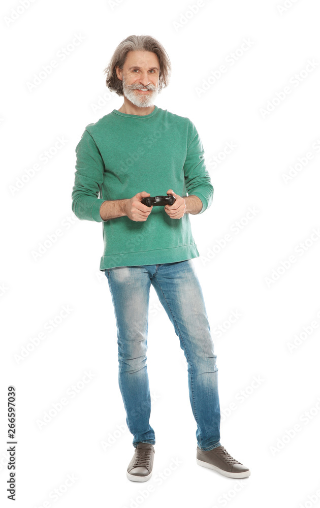 Emotional mature man playing video games with controller isolated on white Emotional mature man playing video games with controller isolated on white