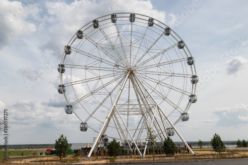 View of the big Ferris wheel in the city Park