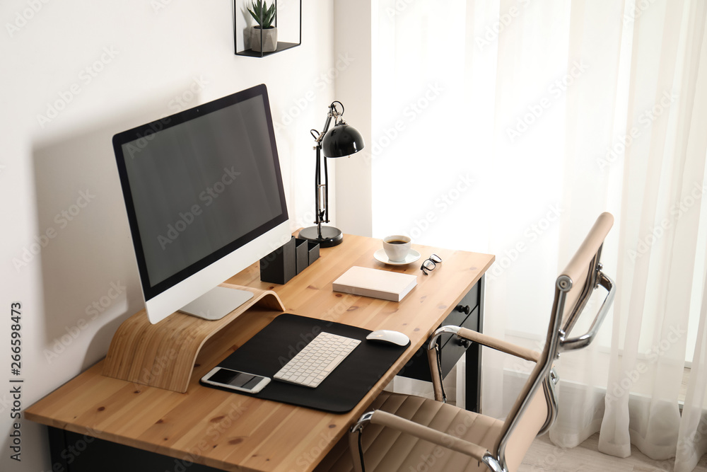 Stylish workplace interior with modern computer on table. Mockup for design Stylish workplace interior with modern computer on table. Mockup for design