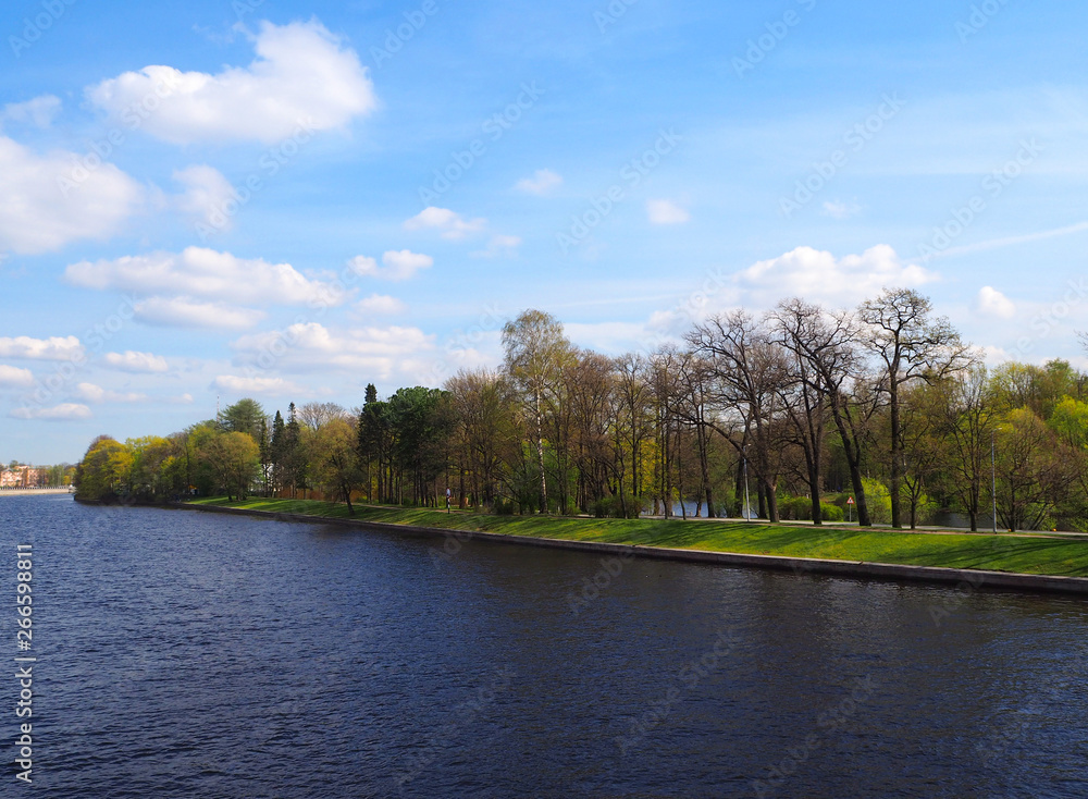 Beautiful landscape of city park and river Beautiful landscape of city park and river