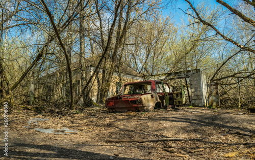 Old abandoned broken car. Exclusion zone of the Chernobyl nuclear disaster