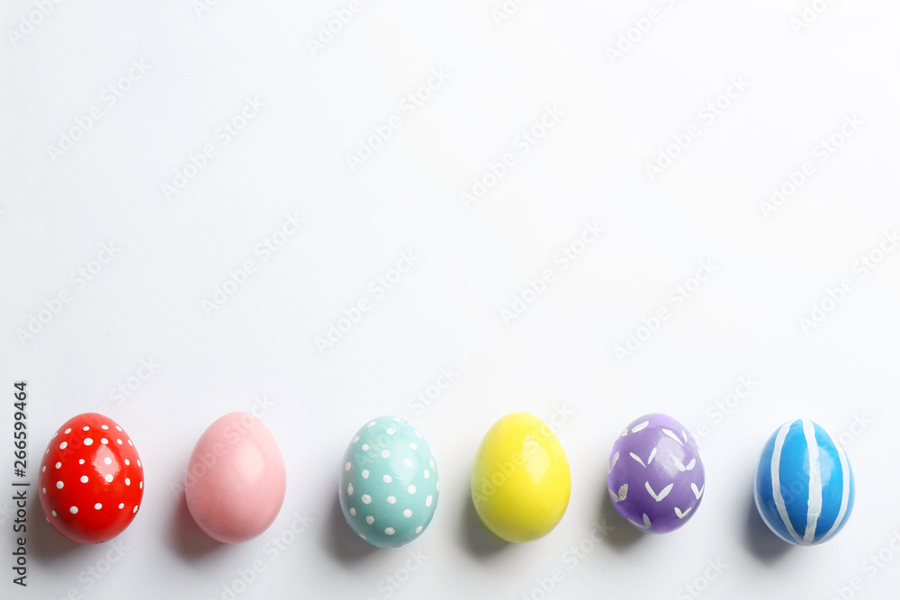 Composition of painted Easter eggs on white background, top view Composition of painted Easter eggs on white background, top view