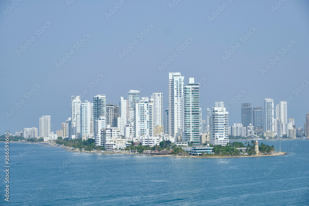 Scenic view of downtown of Cartagena de Indias - old historical touristic town in Colombia. Beautiful summer sunny look of skyline of skyscrapers on coast of Caribbean sea in country in South America