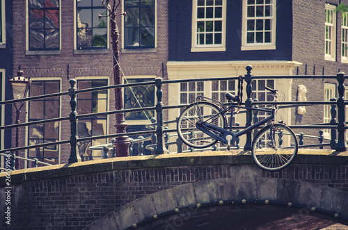Photography bicycle hanging on a bridge in Amsterdam