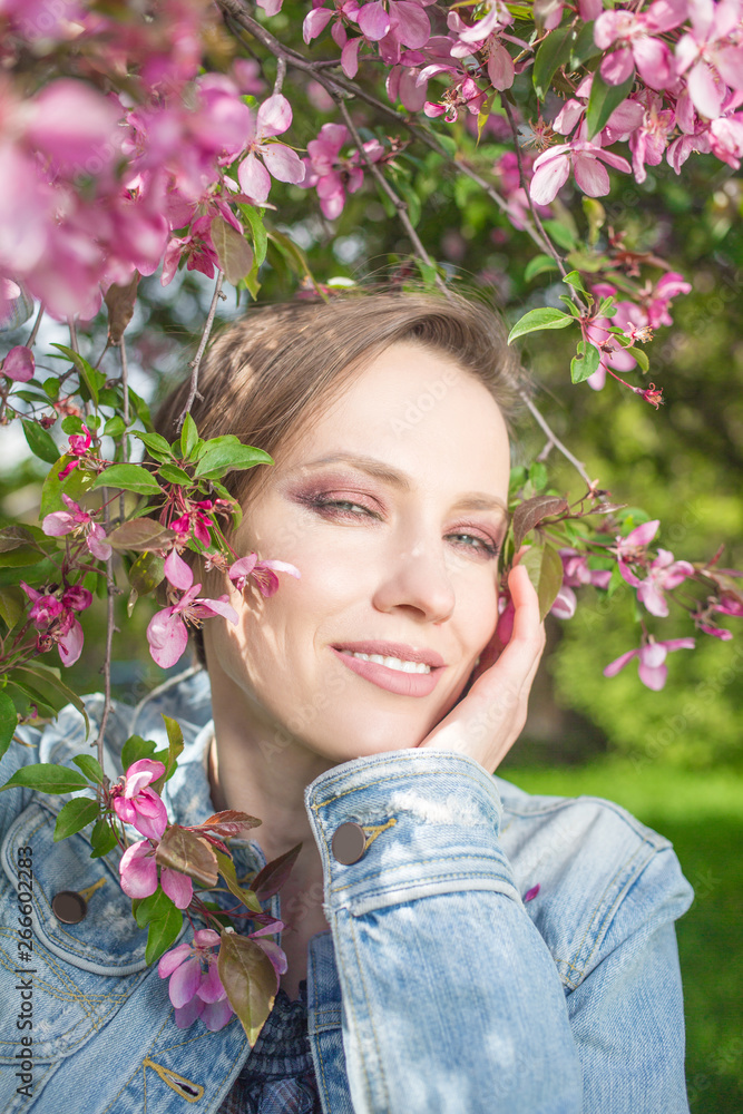 gorgeous girl in blossom spring garden enjoying and relaxing gorgeous girl in blossom spring garden enjoying and relaxing