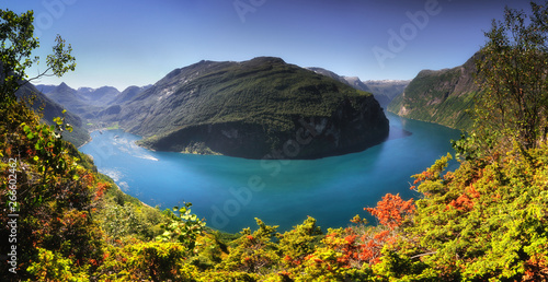 Panoramic aerial landscape of Geiranger fjord in Norway from mountain viewpoint. High resolution panorama,