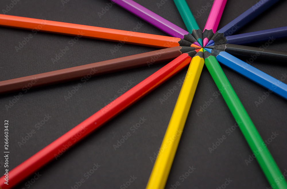 colored pencils on black background colored pencils on black background