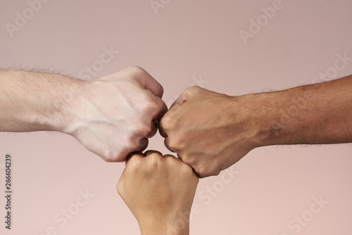 Hand fist bumping photo