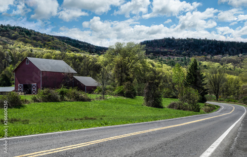 Scenic Drive in New York:  Spring colors begin to show along a country road in the Catskill Mountains of southeastern New York. photo