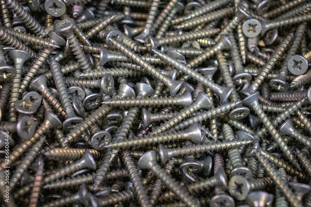 screws on wood and metal, black silver yellow screws on wood and metal, black silver yellow