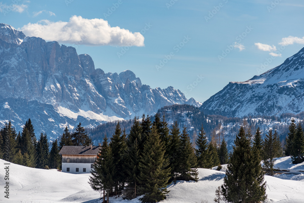 Panorama of Dolomites Alps, Val Gardena, Italy with house in the foreground