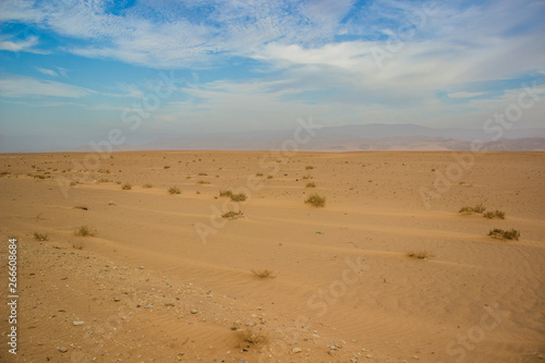 desert smooth sand valley idyllic scenery landscape with background horizontal board between ground and sky  peaceful silent atmosphere and empty copy space for text  