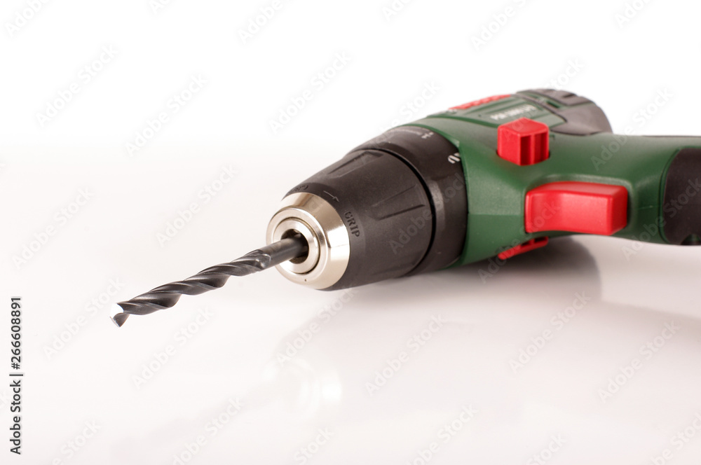 Cordless drill driver isolated on the white background Cordless drill driver isolated on the white background