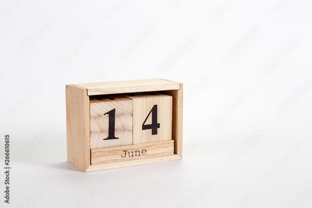 Wooden calendar June 14 on a white background Wooden calendar June 14 on a white background