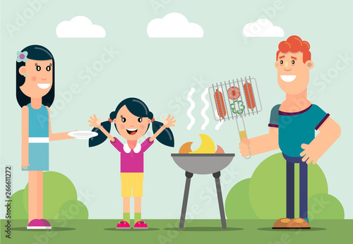 The family cooks meat on the grill