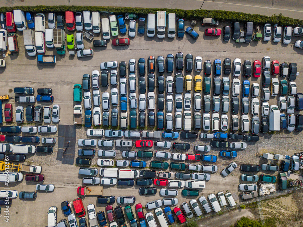 Obraz premium Aerial view of large car parking of car dealer. Secondhand cars.