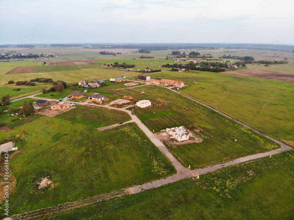 Obraz premium Aerial view of new district under construction in Varluva, Kaunas suburbs, Lithuania