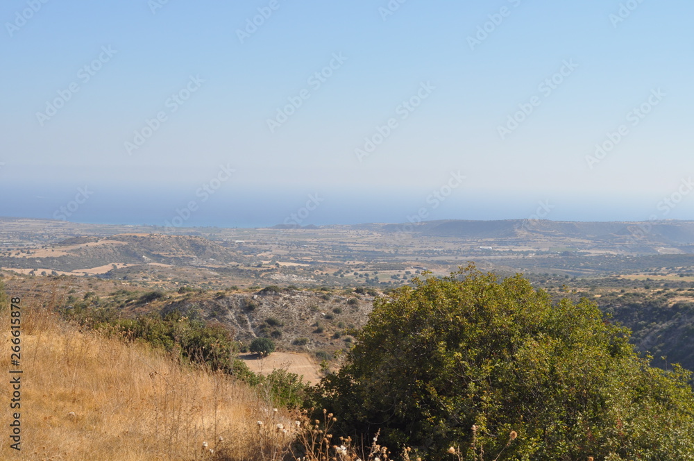 Fototapeta premium The beautiful natural mountain landscape in the Cyprus massif in the background at sunset