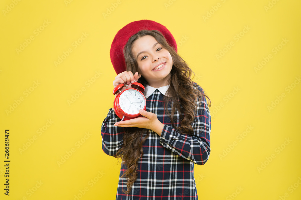 Define your own rhythm of life. Happy hours concept. Schedule and timing. Girl with alarm clock. Set up alarm clock. Child little girl hold red clock. It is time. Always on time. It is never too late Define your own rhythm of life. Happy hours concept. Schedule and timing. Girl with alarm clock. Set up alarm clock. Child little girl hold red clock. It is time. Always on time. It is never too late
