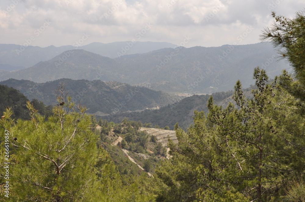 The beautiful natural mountain landscape in the Cyprus massif in the background at sunset