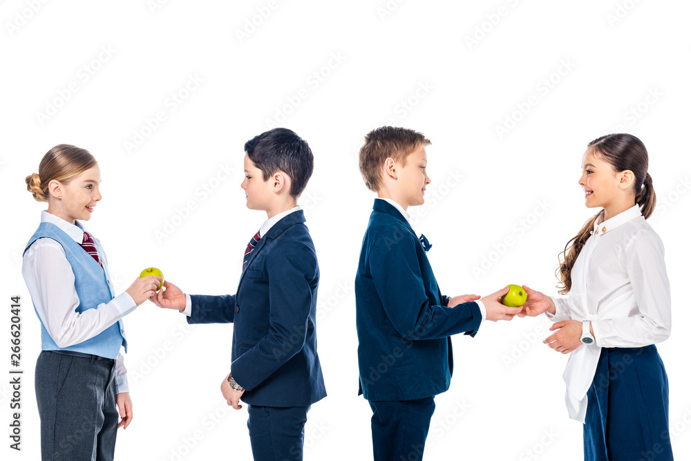 schoolchildren pretending to be businesspeople sharing apples Isolated On White schoolchildren pretending to be businesspeople sharing apples Isolated On White